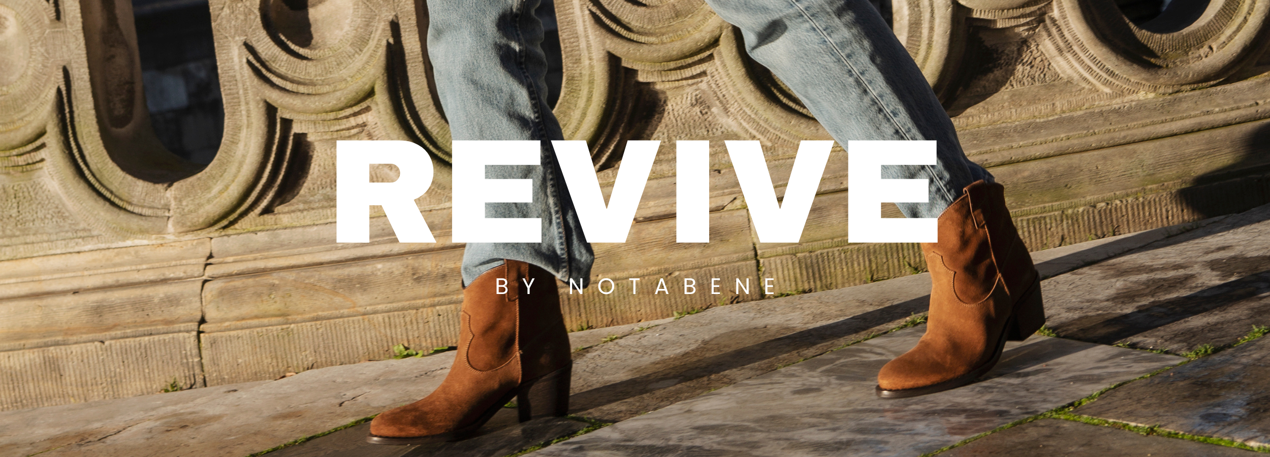 REVIVE logo on a photo with legs walking in a pair of brown suede ankle boots