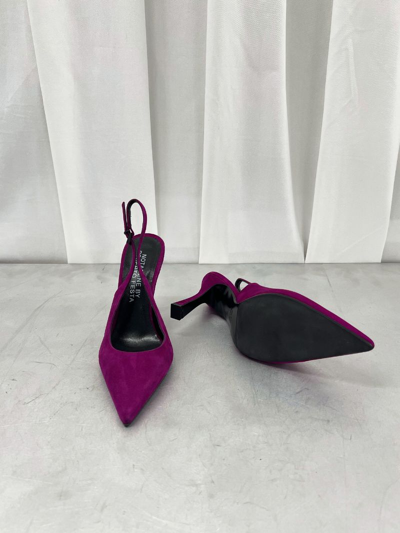 Purple slingback stilettos with a pointed toe