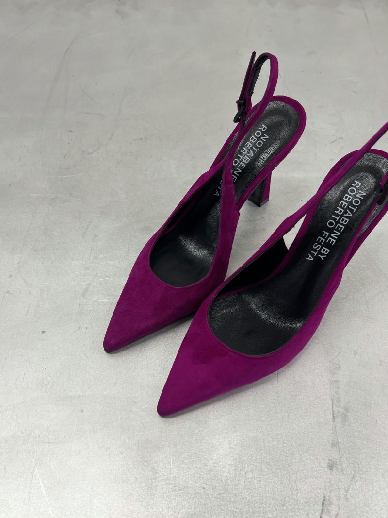 Purple slingback stilettos with a pointed toe