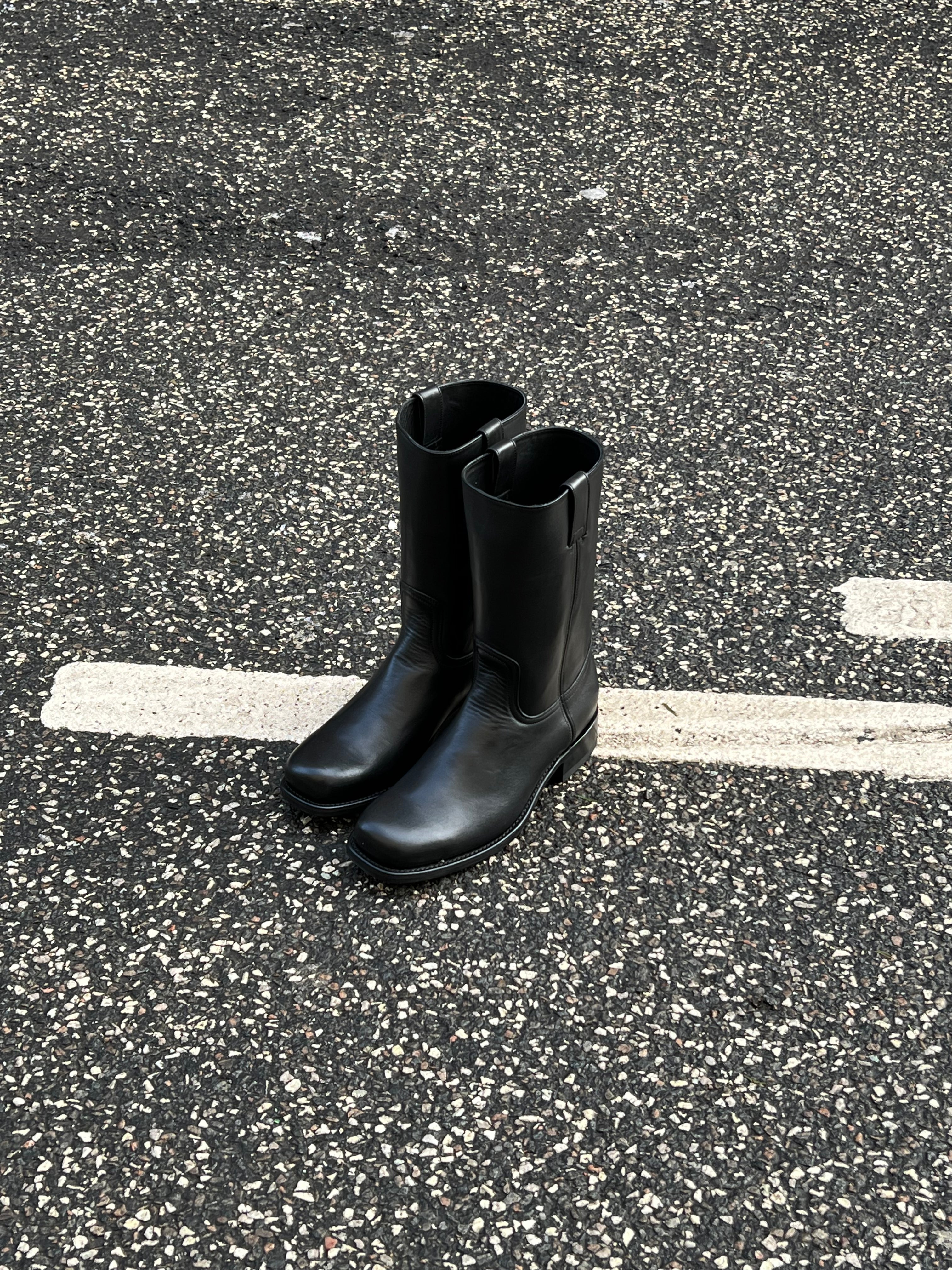 Achilles boots, black leather