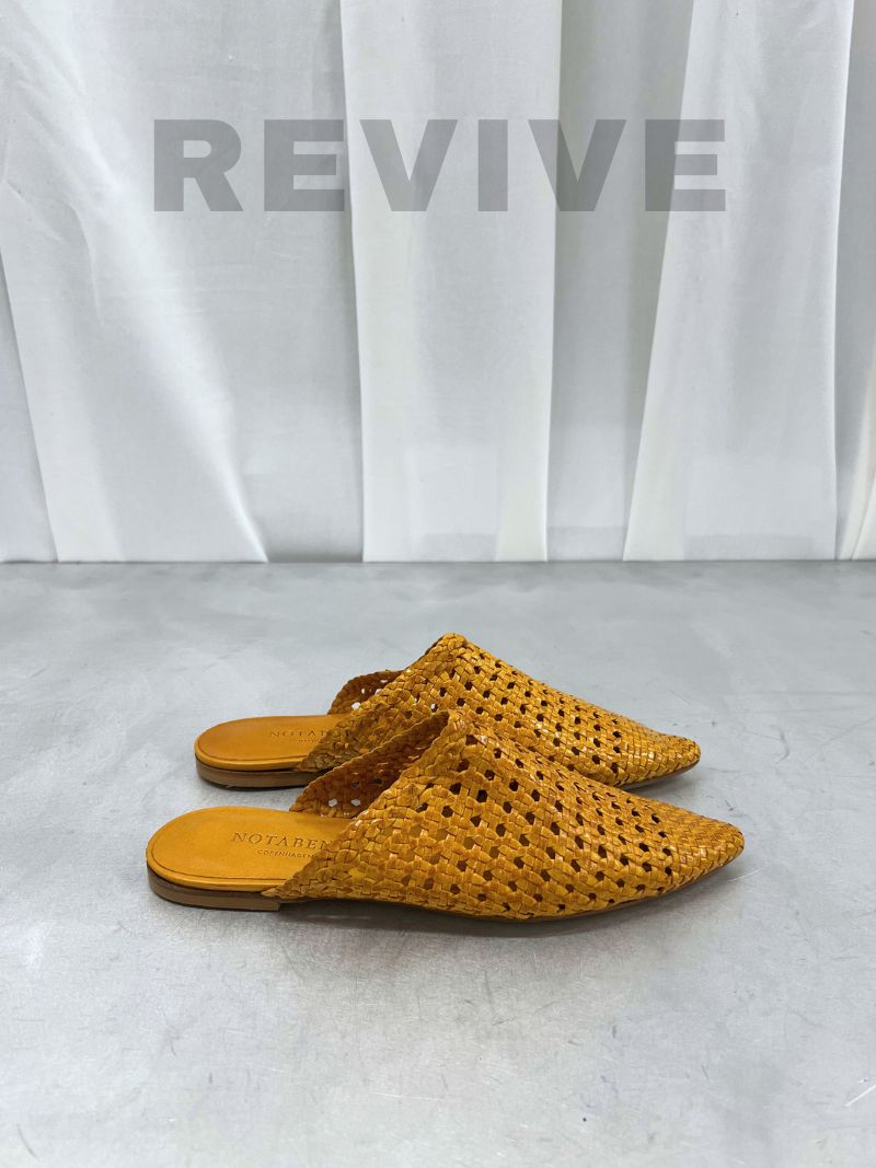Yellow braided leather mules, size 37