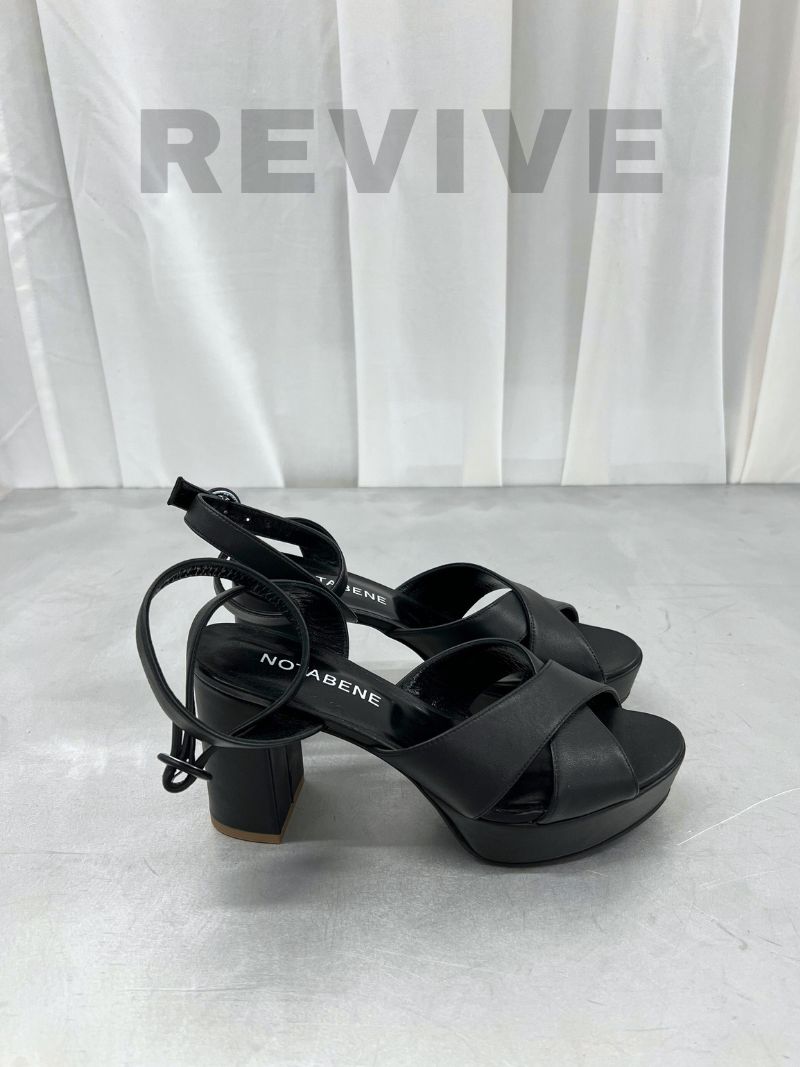 Black platform sandals with ankle strap and crossed straps, size 39