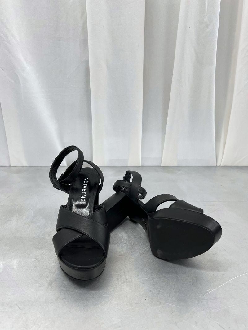 Black platform sandals with ankle strap and crossed straps, size 39