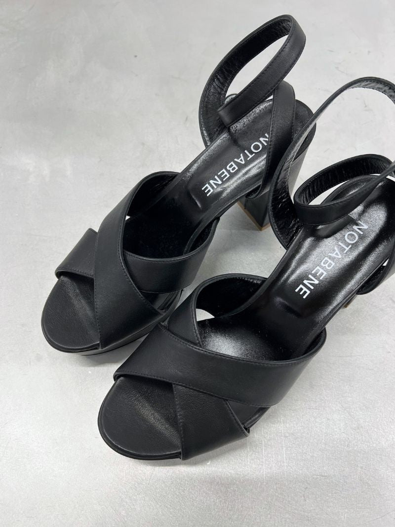 Black platform sandals with ankle strap and crossed straps, size 39